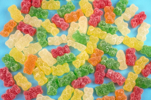 Selection of gummy bears on Blue Background