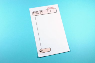 close-up shot of restaurant check list on blue background