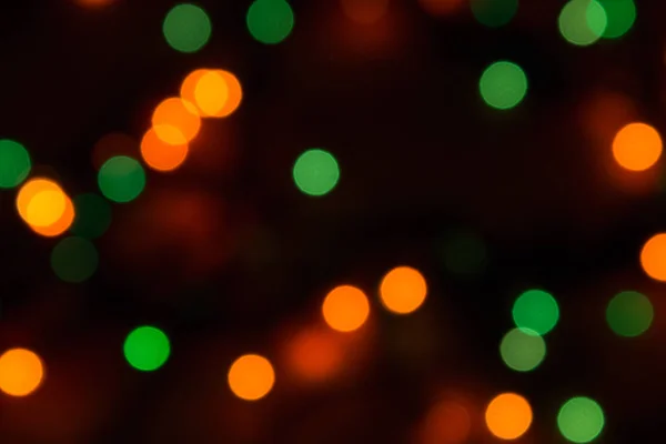 クリスマス ガーランド ライトとぼやけたテクスチャ — ストック写真