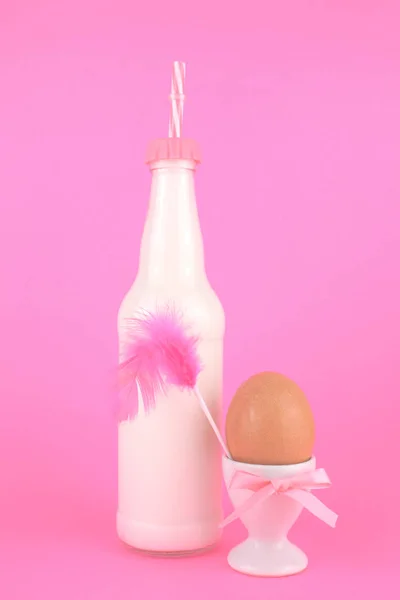 Bottle of Milk on Colored Background.