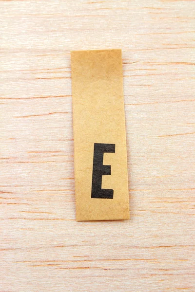 Close Shot Letter Sticker Attached Wooden Surface — Stock Photo, Image