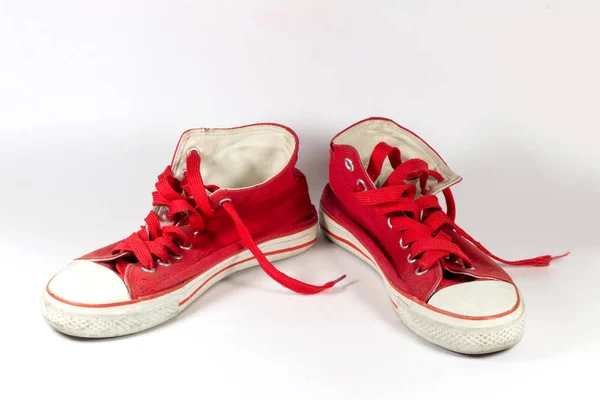 Old Red Sneakers White Background Stock Photo