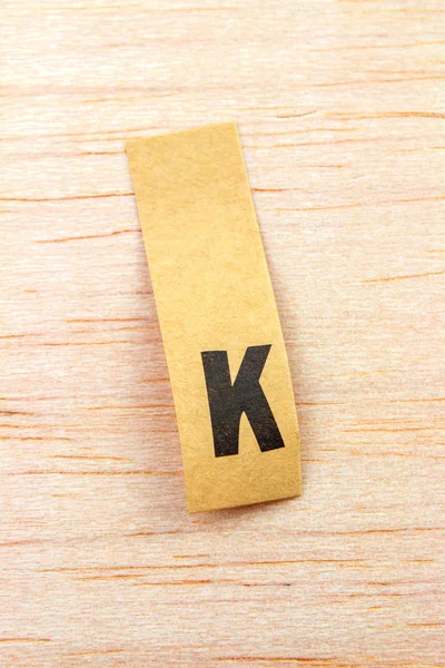 Close Shot Letter Sticker Attached Wooden Surface — Stock Photo, Image