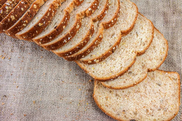 Plasterki Świeżego Pieczywa Tle Worek — Zdjęcie stockowe