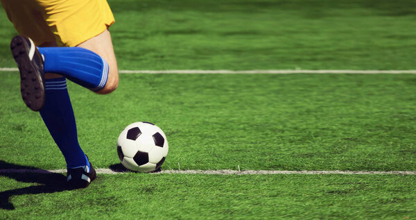 Traditional soccer game with a leather ball