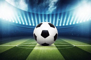 Futbol stadyumu, parlak ışıklar, saha manzarası. Futbol konsepti
