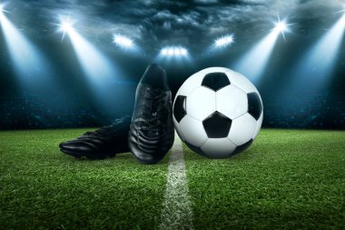 Futbol stadyumu, parlak ışıklar, saha manzarası. Futbol konsepti