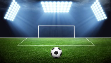 Futbol stadyumu, parlak ışıklar, saha manzarası. Futbol konsepti