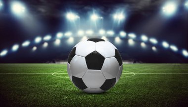 Futbol stadyumu, parlak ışıklar, saha manzarası. Futbol konsepti