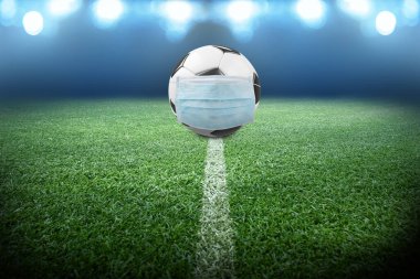 Avrupa futbolu iptal konsepti. Koronavirüs maskeli top