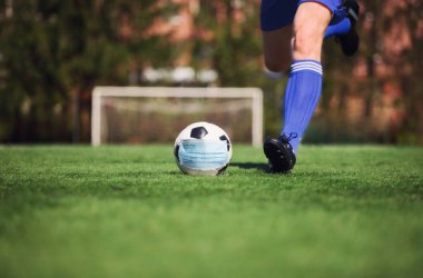 Avrupa futbolu iptal konsepti. Koronavirüs maskeli top