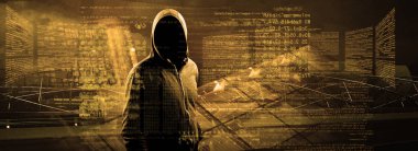 Hacker bir siber uzaya girmek için dizüstü bilgisayarına bir kod yazdırır