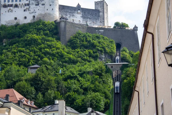 The funicular of Hohensalzburg castle brings people up and down the mountain