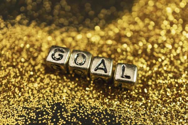 Soyut altın bokeh altın zarif zemin üzerine ışık altın kelime küp