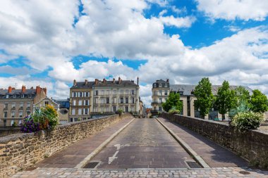 Bridge.Banks of the Mayenne river, City of Laval, Mayenne, Pays de Loire, France. August 5, 2018 clipart