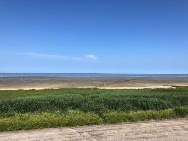 Hollanda, Friesland 'da dalgalar çekildiğinde geniş deniz