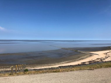 Hollanda, Friesland 'da dalgalar çekildiğinde geniş deniz