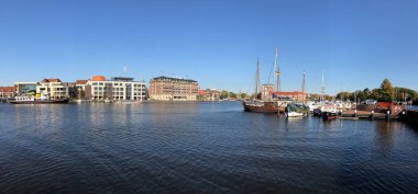Panorama from the old inland port in Emden, Germany clipart
