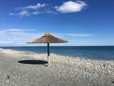 Yunanistan 'daki velika plajında şemsiye