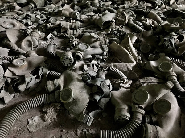 Gas masks on the ground in a school at Pripyat a ghost town in northern Ukraine