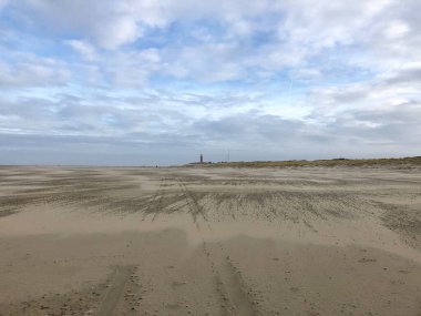Hollanda 'da deniz feneri olan Texel Plajı