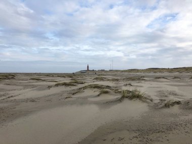 Hollanda 'da deniz feneri olan Texel Plajı