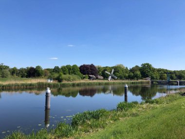 Village Laag-Keppel along the Old IJssel, Gelderland, The Netherlands clipart