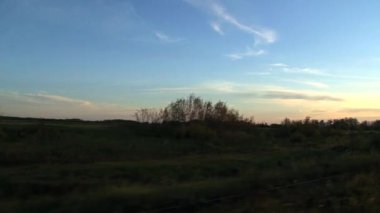 Toronto 'dan Vancouver, Kanada' ya bir tren turu sırasında gün batımı manzarası