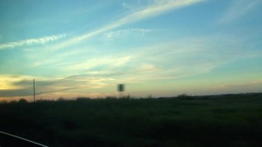 Toronto 'dan Vancouver, Kanada' ya bir tren turu sırasında gün batımı manzarası