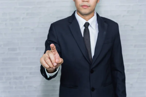 Hombre Negocios Señala Algo Con Dedo Índice Espacio Copia —  Fotos de Stock
