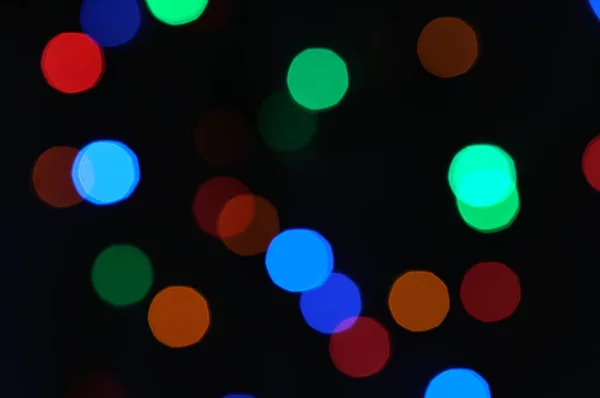 Luces Bokeh Desenfocadas Coloridas Sobre Fondo Negro Luces Navideñas Multicolores —  Fotos de Stock