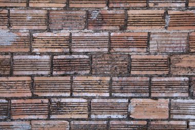 detaylı yakın plan eski desenli kırmızı tuğla duvar, zengin renkler ve gölgeler arka plan pazarlama için uygun arkaplan mimari tasarımı