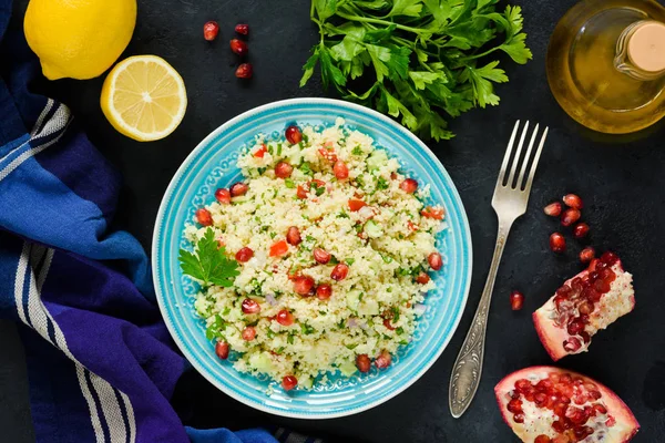 Tabbouleh salad with couscous and pomegranate — Stock Photo, Image