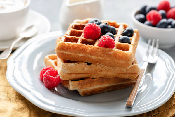 Homemade belgian waffles with berries