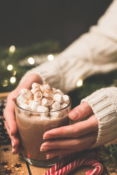 Woman holding mug of hot chocolate with marshmallows — Stock Photo, Image