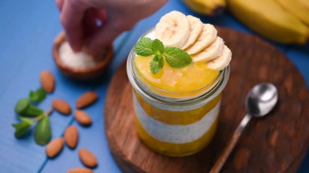 Chia Pudding Met Mango Mousse Houten Portie Bord Concept Beelden — Stockvideo