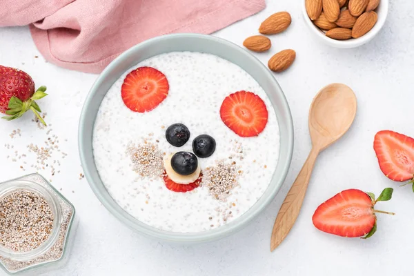 Funny face breakfast yogurt with fruits for kids