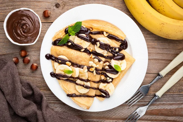 Crepes with banana and chocolate