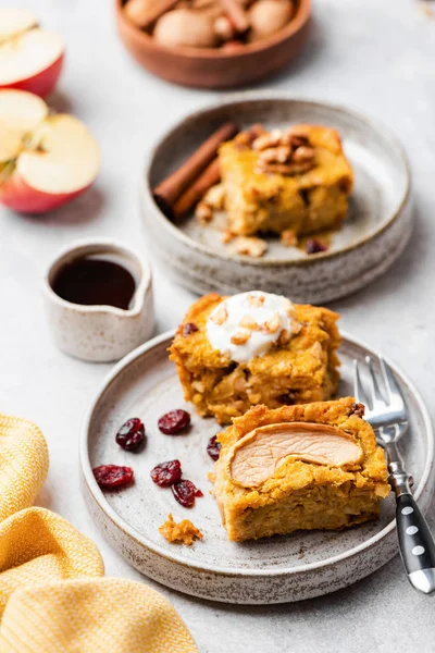 Sweet pumpkin cake with walnuts, cinnamon and dried cranberry