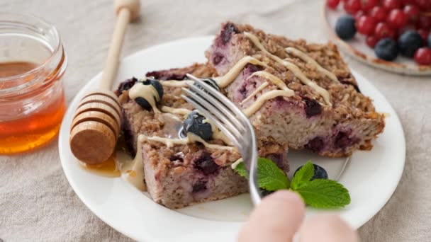 Eating Vegan Oatmeal Pie Blueberries Nut Butter Closeup View Tasty — Stock Video