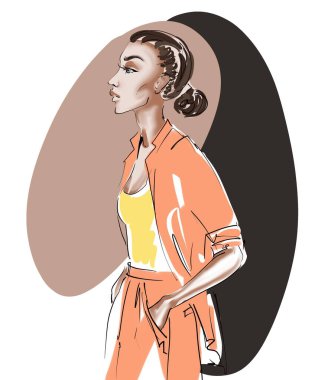 Soyut bir arka planda, elleri cebinde turuncu bir takım elbiseli şık bir kız.