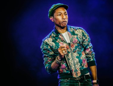 Pharrell Williams performing on stage during  music festival