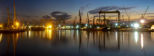 industrial areas, shipyard and port after sunset - Szczecin, Poland