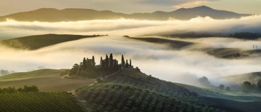scenic view of Tuscan landscape at sunrise, Pienza, Italy clipart