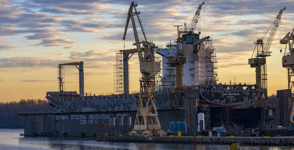 Merchant ship in the dry dock of the repair yard — Stock Photo, Image