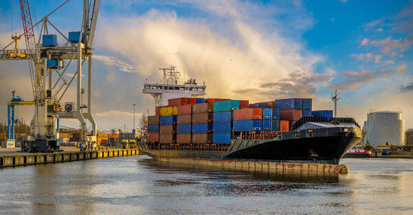 Container ship leaving from the port
