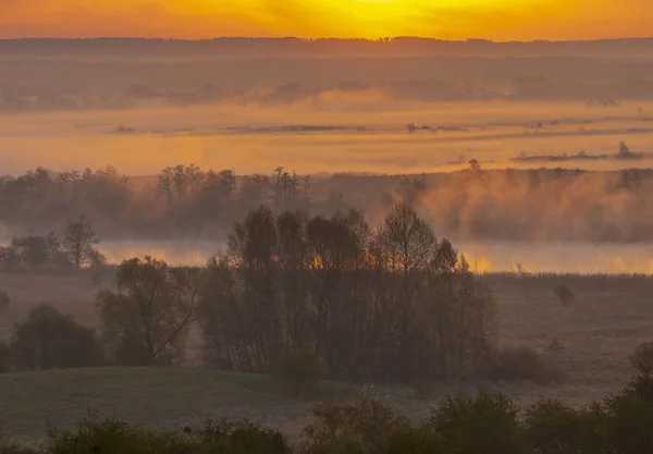 spring, misty sunrise over the valley