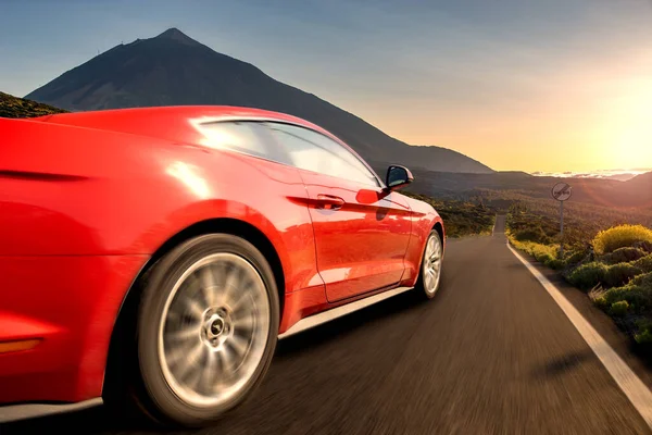 Red sports car running at high speed on the way .Ford Mustang,ro