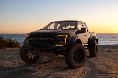 Ford F-150 Raptor - Gezegendeki En Ekstrem Üretim Kamyonu Okyanus kıyısındaki bir kum tepesinde duruyor