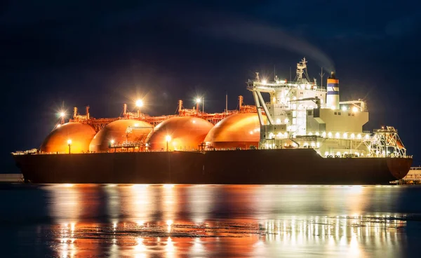 Tanker in the port with lights on, night photography